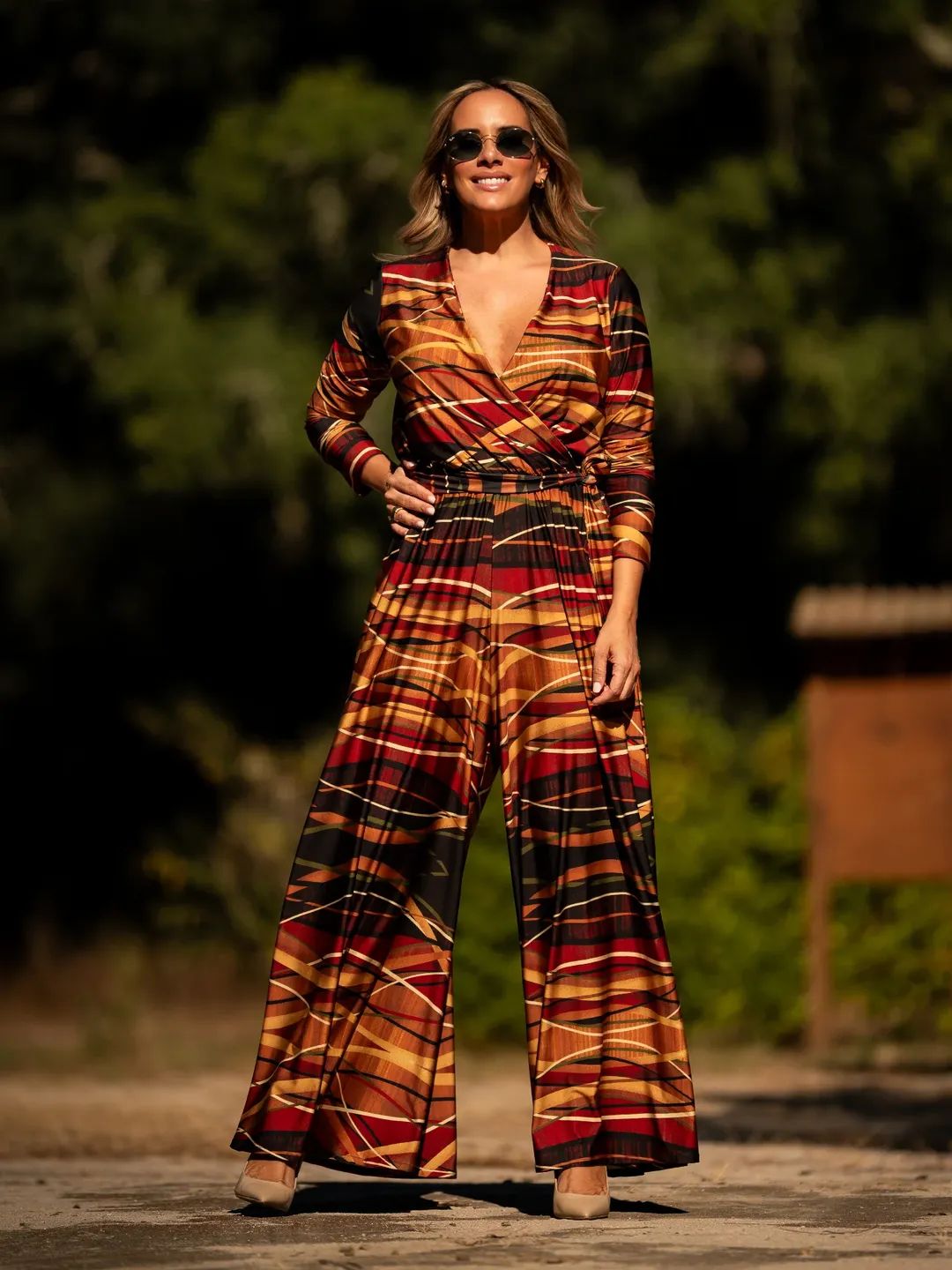 Macacão estampado Outono, com riscas laranja, vermelho e castanho, da Manuela Moreira, à venda na Charme Store, Ovar